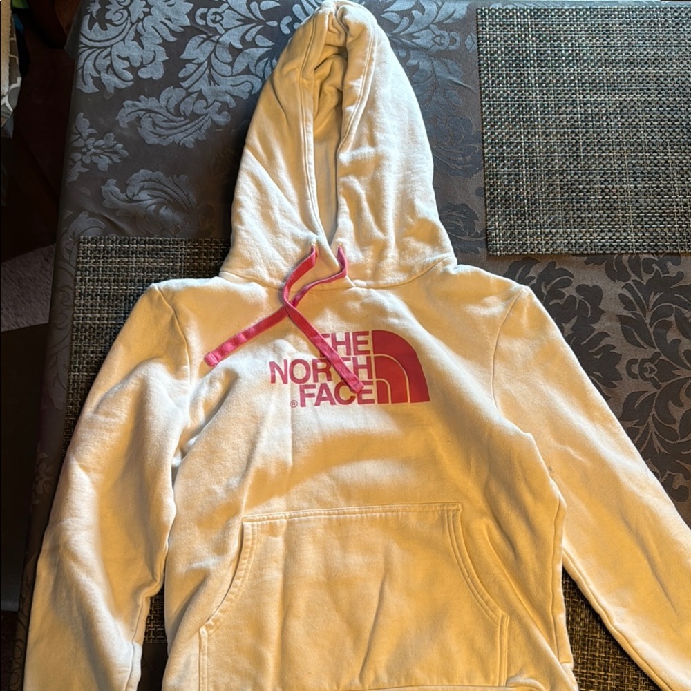 The North Face Cream Hoodie with Pink Logo
